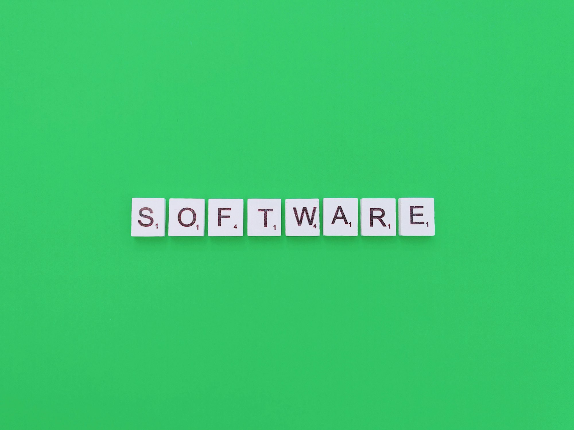 The word "software" in Scrabble tiles on a green background representing our content on the limitations of an ATS.